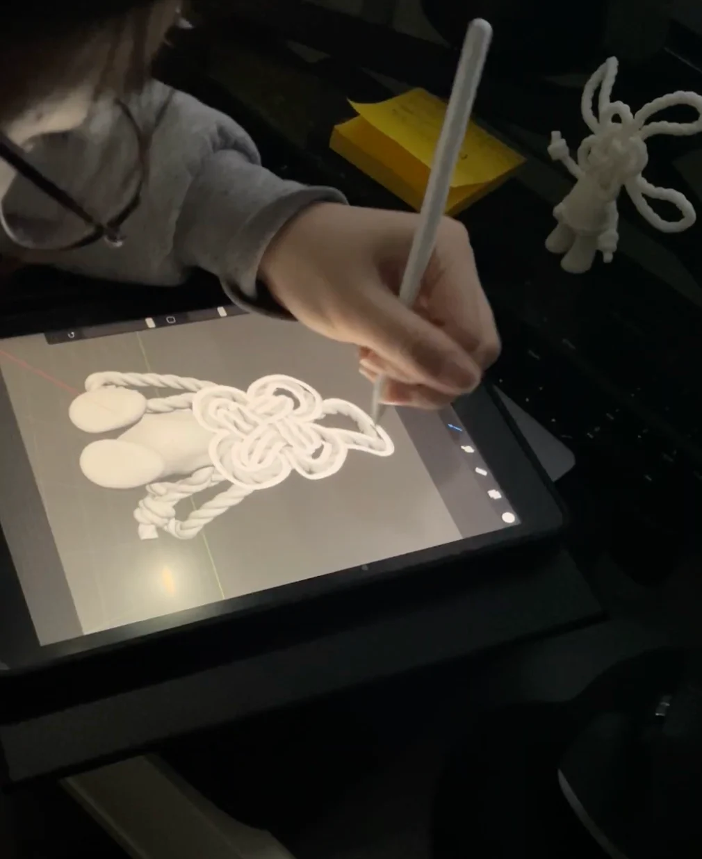 Drawing the packaging artwork on an iPad over the character model